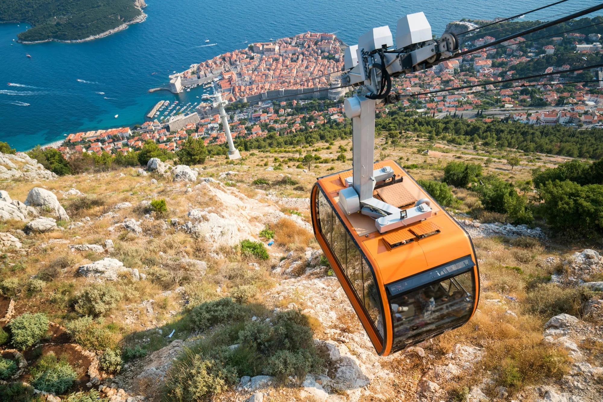 The Dubrovnik cable car climbing above the old town and the Adriatic coast